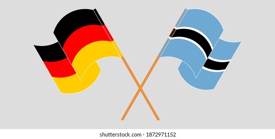 Banderas cruzadas y ondeando banderas de Alemania y Botswana