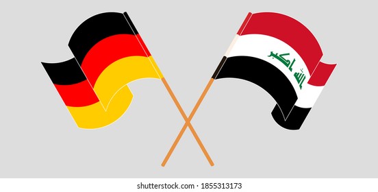 Crossed and waving flags of Germany and Iraq