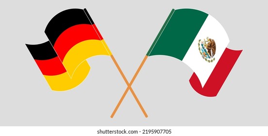 Crossed and waving flags of Germany and Mexico. Vector illustration
