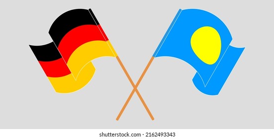 Crossed and waving flags of Germany and Palau. Vector illustration
