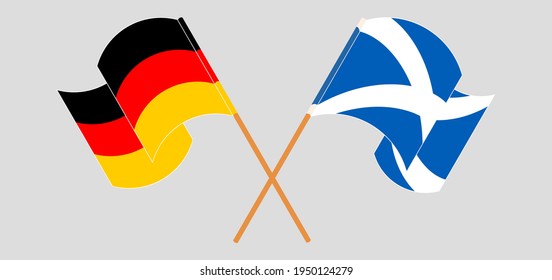 Banderas cruzadas y ondeando banderas de Alemania y Escocia