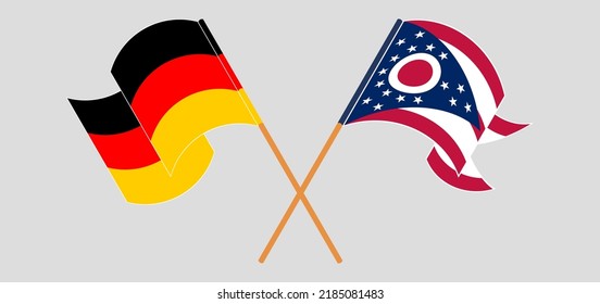 Crossed and waving flags of Germany and the State of Ohio. Vector illustration
