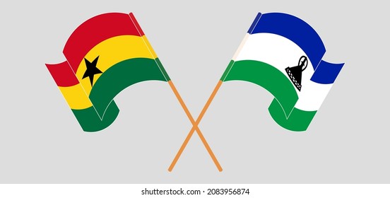 Crossed and waving flags of Ghana and Kingdom of Lesotho. Vector illustration
