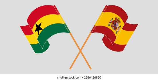 Crossed and waving flags of Ghana and Spain