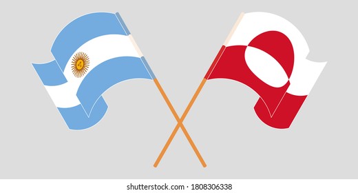 Crossed and waving flags of Greenland and Argentina