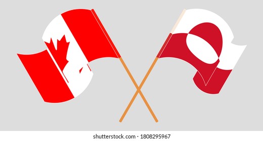 Crossed and waving flags of Greenland and Canada
