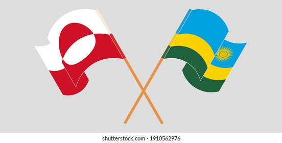 Crossed and waving flags of Greenland and Rwanda