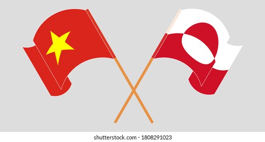 Crossed and waving flags of Greenland and Vietnam
