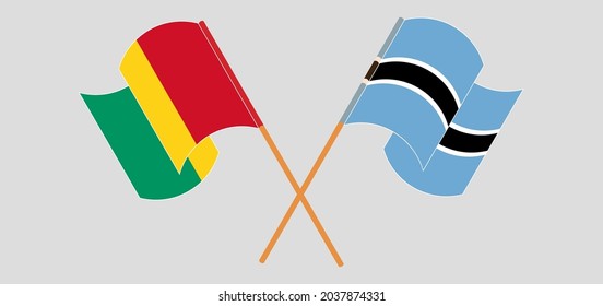 Crossed and waving flags of Guinea and Botswana