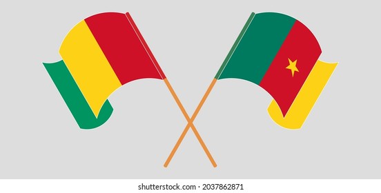 Cruzada y ondeando banderas de Guinea y Camerún