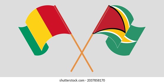 Crossed and waving flags of Guinea and Guyana