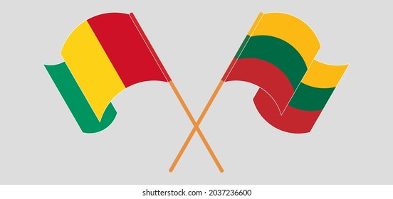 Crossed and waving flags of Guinea and Lithuania