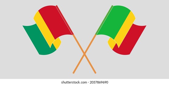 Cruzada y ondeando banderas de Guinea y Mali