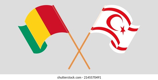 Crossed and waving flags of Guinea and Northern Cyprus. Vector illustration
