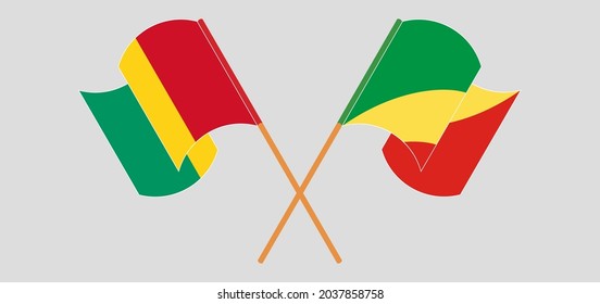 Crossed and waving flags of Guinea and Republic of the Congo
