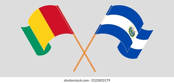 Crossed and waving flags of Guinea and Republic of El Salvador. Vector illustration.
