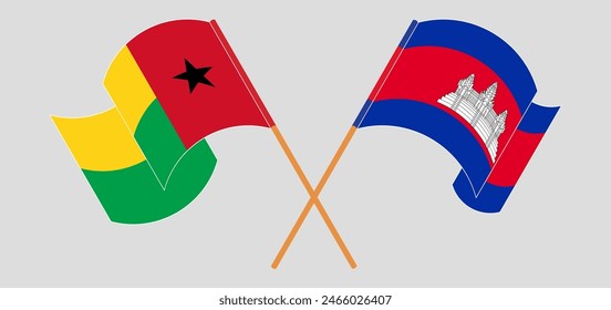 Crossed and waving flags of Guinea-Bissau and Cambodia. Vector illustration
