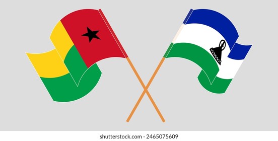 Crossed and waving flags of Guinea-Bissau and Lesotho. Vector illustration
