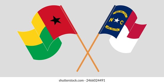 Crossed and waving flags of Guinea-Bissau and The State of North Carolina. Vector illustration
