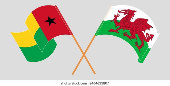 Crossed and waving flags of Guinea-Bissau and Wales. Vector illustration
