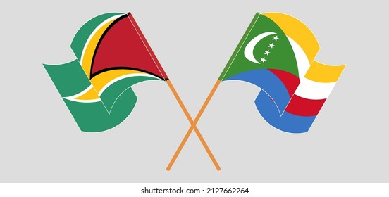 Crossed and waving flags of Guyana and Comoros. Vector illustration
