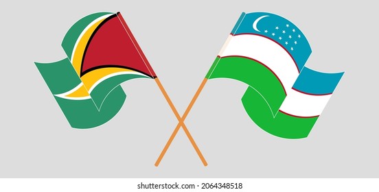 Crossed and waving flags of Guyana and Uzbekistan