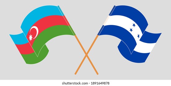 Crossed and waving flags of Honduras and Azerbaijan