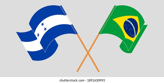 Crossed and waving flags of Honduras and Brazil
