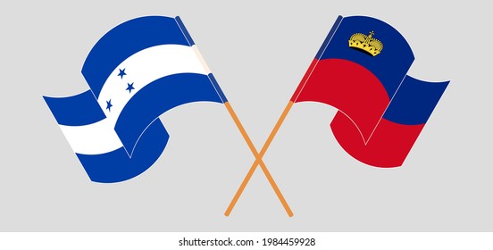 Crossed and waving flags of Honduras and Liechtenstein