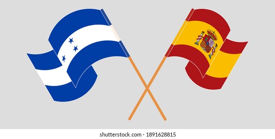 Crossed and waving flags of Honduras and Spain