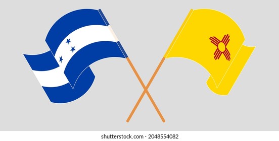 Banderas cruzadas y ondeando banderas de Honduras y del Estado de Nuevo México
