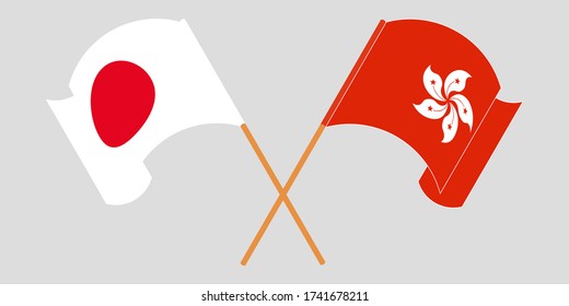 Crossed and waving flags of Hong Kong and Japan