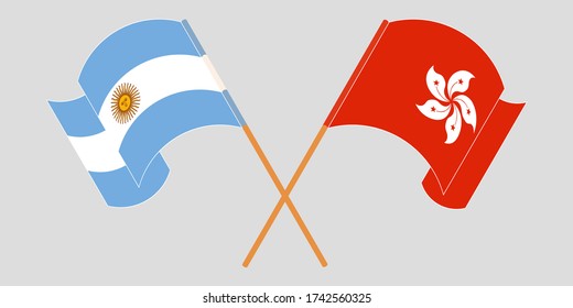 Crossed and waving flags of Hong Kong and Argentina