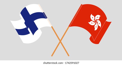 Crossed and waving flags of Hong Kong and Finland