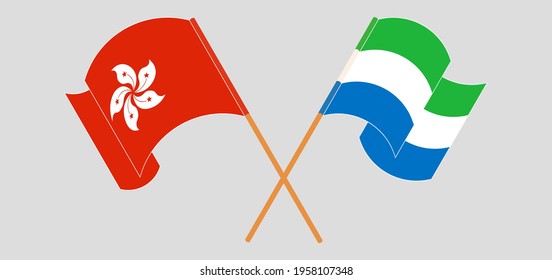 Crossed and waving flags of Hong Kong and Liechtenstein