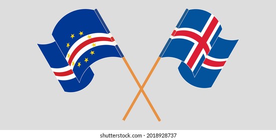 Crossed and waving flags of Iceland and Cape Verde