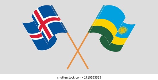 Crossed and waving flags of Iceland and Rwanda