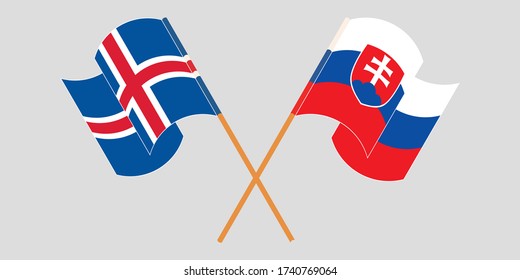 Crossed and waving flags of Iceland and Slovakia