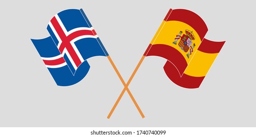 Crossed and waving flags of Iceland and Spain