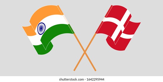 Crossed and waving flags of India and Denmark