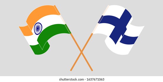 Crossed and waving flags of India and Finland