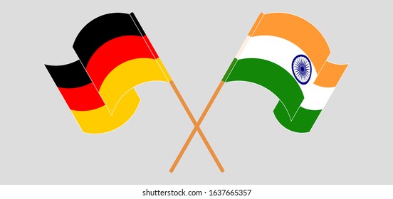 Crossed and waving flags of India and Germany