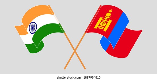 Banderas cruzadas y ondeando banderas de la India y Mongolia