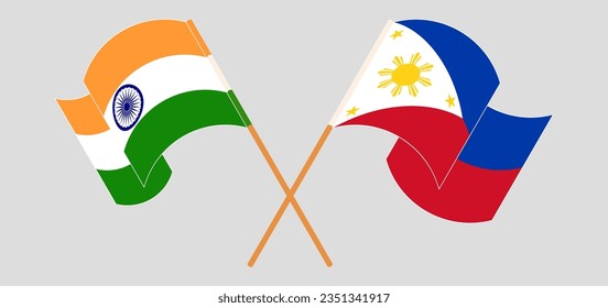 Crossed and waving flags of India and the Philippines. Vector illustration
