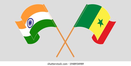 Crossed and waving flags of India and Senegal