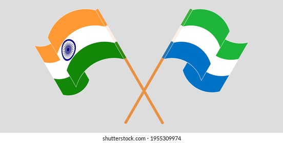 Crossed and waving flags of India and Sierra Leone