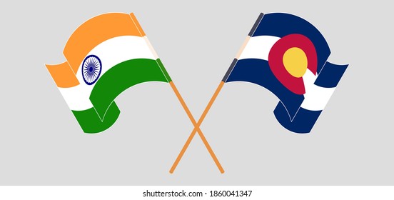 Crossed and waving flags of India and The State of Colorado