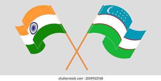 Crossed and waving flags of India and Uzbekistan