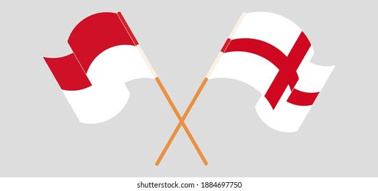 Crossed and waving flags of Indonesia and England