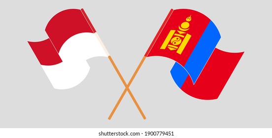 Crossed and waving flags of Indonesia and Mongolia